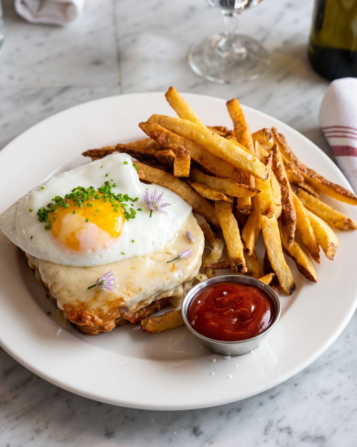 Fried egg with fries and ketchup